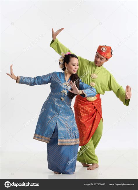 Malay Couple Traditional Costumes Posing Studio Stock Photo by