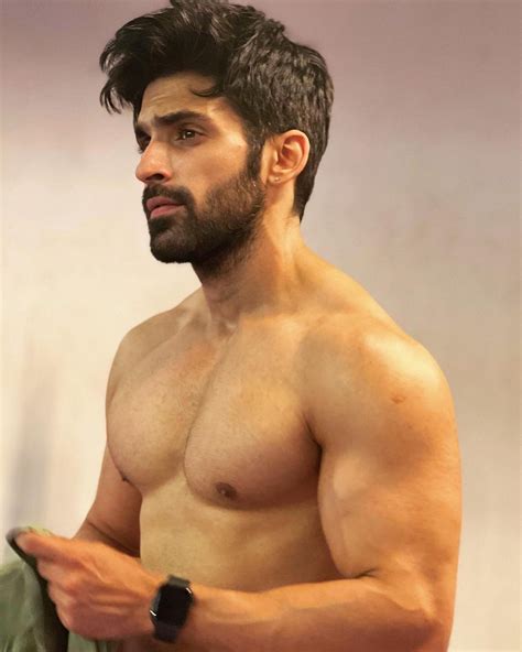 Shirtless Bollywood Men: Cute Indian guy takes his top off for a series