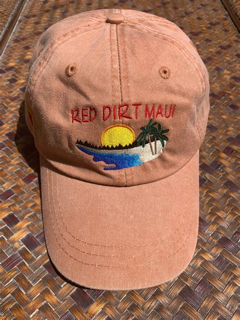 beach scene hat red dirt maui