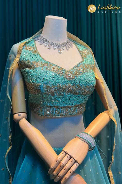 lushkara aqua blue mirror work lehenga  net dupatta