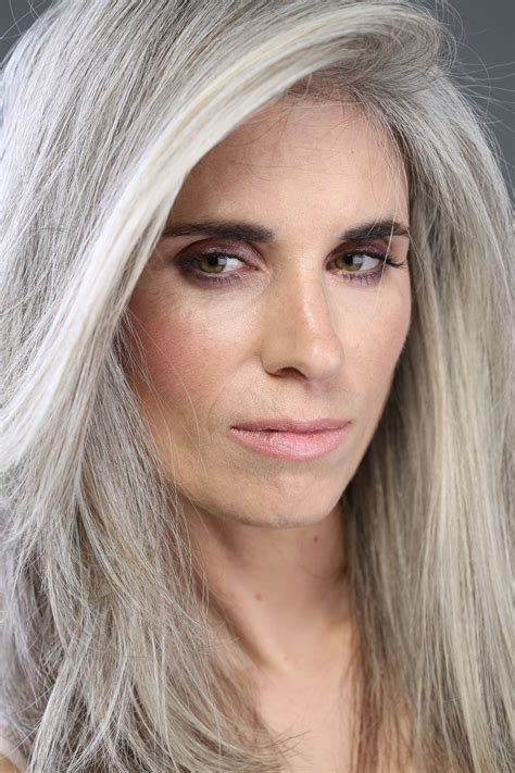 silver hair - brown eyes. so many of the pictures, the models are blue