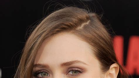 Elizabeth Olsen's Hair and Makeup at the Godzilla Premiere | Glamour