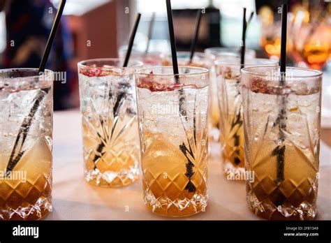 drink in a crystal glass at a party Stock Photo - Alamy