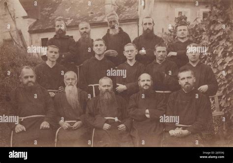 A group of roman catholic Franciscan Monks are posing very well for the ...