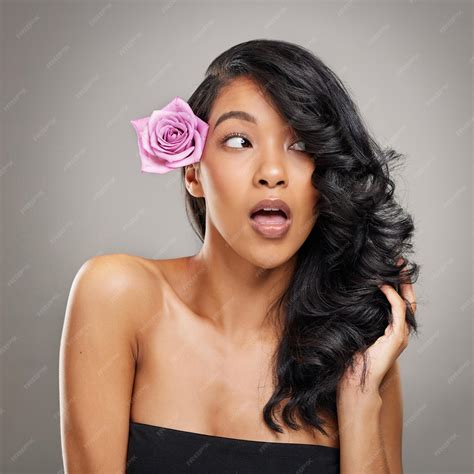 Premium Photo | Hair care shock and woman with flower in studio with