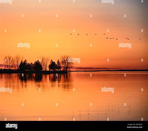 sunset on the river Stock Photo - Alamy