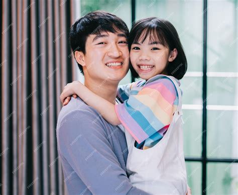 Premium Photo | Asian father and daughter at home