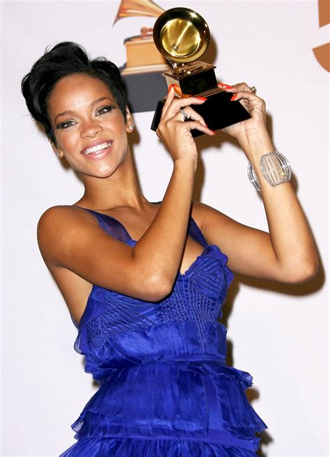 Rihanna Through the Years: Photos of the Singer, Beauty Mogul | Us Weekly