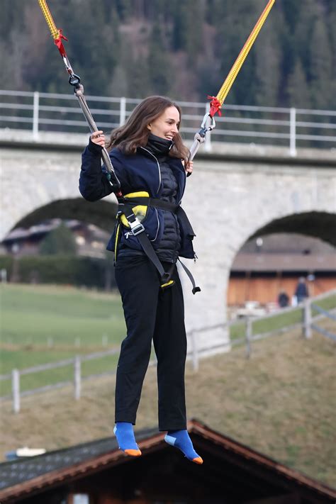 NATALIE PORTMAN on a Bungee Trampoline in Gstaad 01/01/2023 – HawtCelebs