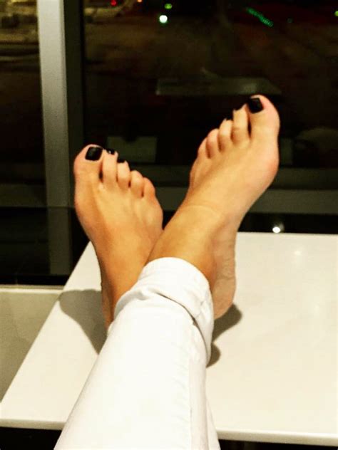 Madeleine West's feet