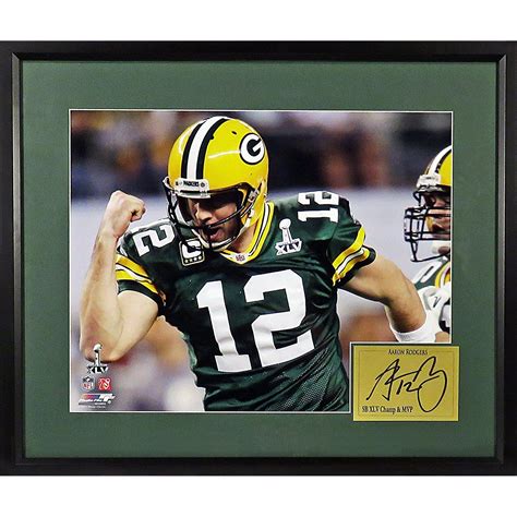 √ Autographed Aaron Rodgers Football