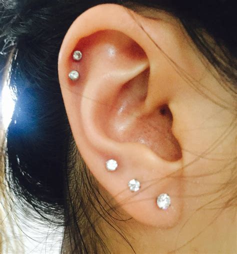 My right ear is finally complete! What do you guys think? : r/piercing