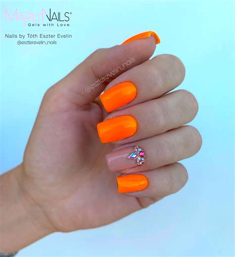Get Inspired by 30 Neon Orange Nail Designs of 2024
