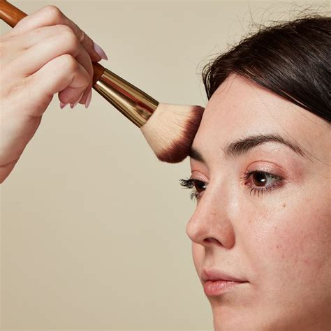 apply face powder   flawless finish