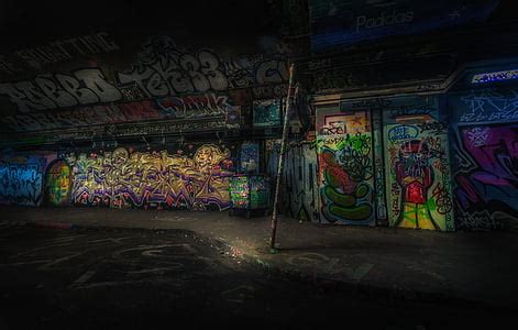 Royalty-Free photo: Empty warehouse filled with graffiti | PickPik