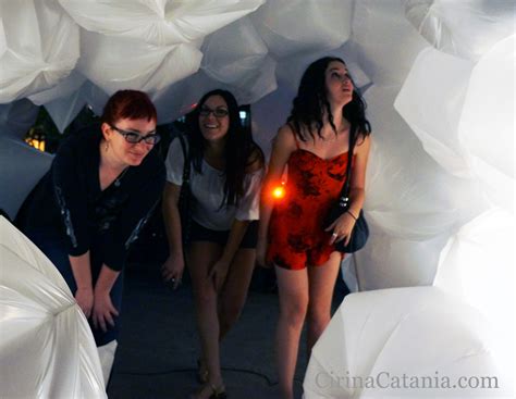 Sharon Sibley, Jessie Miller and Jessica Jewell walk through an art