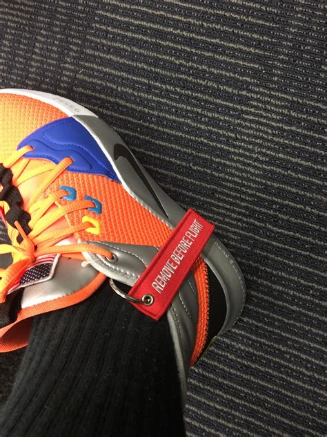 Should I remove the tag before flight? I’ve gotten mixed signals from a