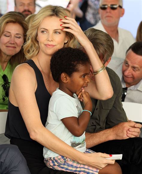 charlize theron adopts  child  daughter named august