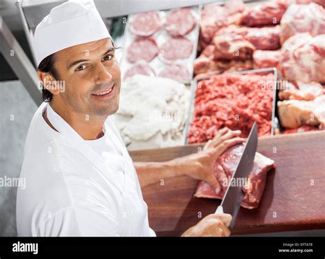 cut  meat butcher cutting meat  res stock photography  images
