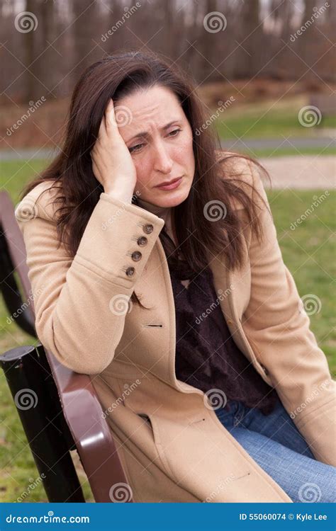 Sad Woman Outside stock photo. Image of furniture, hopelessness - 55060074