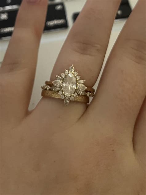 help! which order to wear rings? husband and I got new bands and I can