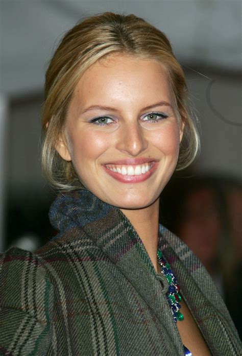 Download Karolina Kurkova Striking A Confident Pose At An Outdoor