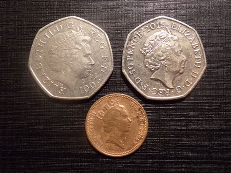 №119. 50 пенсов 2001 год. 50 пенсов 2015 год. 1 пенс 1988 год ...