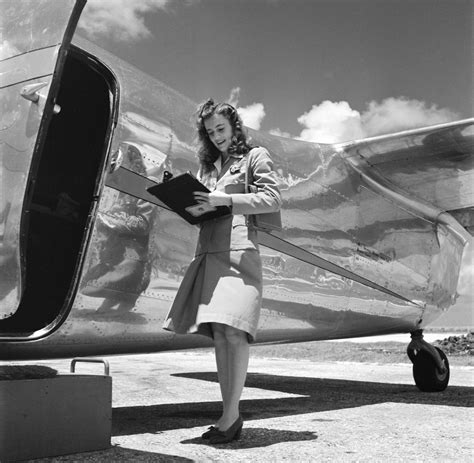 47 Stunning Photos Of Flight Attendant Uniforms Over The Years