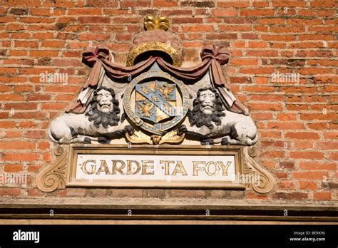 Magdalene College coat of arms; the inscription Garde ta Foy means keep ...