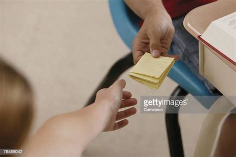 passing  note stock  high res pictures  images getty