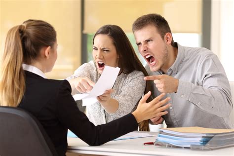 Angry couple claiming at office | Security Systems and Security