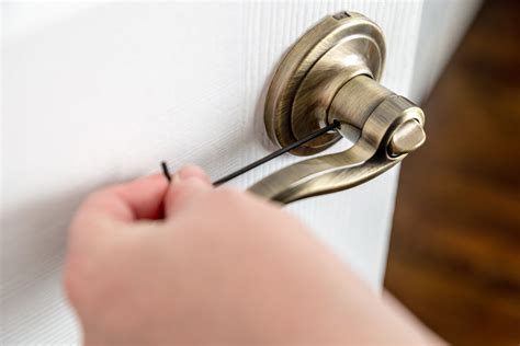 how to fix a loose doorknob with no visible screws