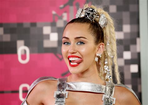 Miley Cyrus strips naked again for V Magazine backstage at the MTV VMAs
