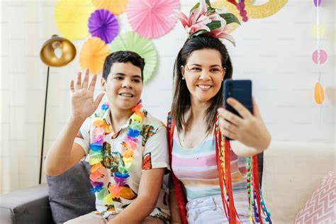 Brazilian Carnival. Mother and son celebrating carnival at home photo