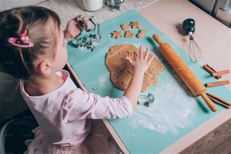 Little Girl Making Cookies - Stock Photos | Motion Array