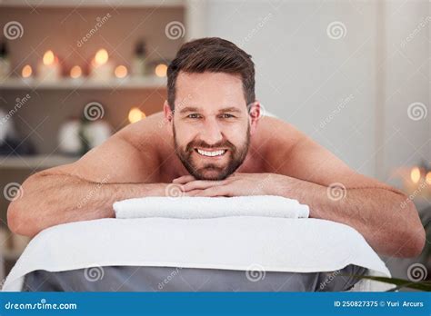 portrait handsome caucasian man lying   table   spa