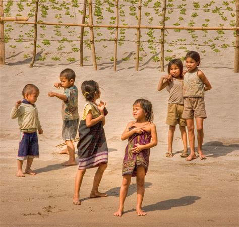 Children of Laos :) | These children see a few boats a week … | Flickr 