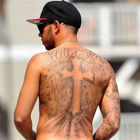 Lewis Hamilton Tattoos and The Real Meanings Behind Them