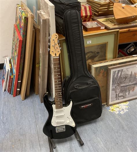 Playmate childs black electric guitar – Badgers Auctions | On-site and