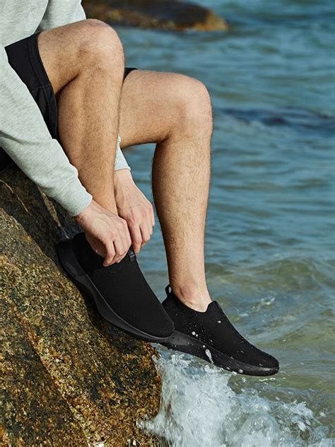 Bernie Waterproof Slip on Sneakers in Solid Black-Men's Shoes | VIVAIA