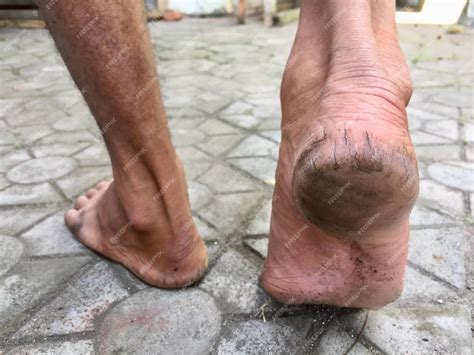 Premium Photo | The feet of a person who is splashing with water causes