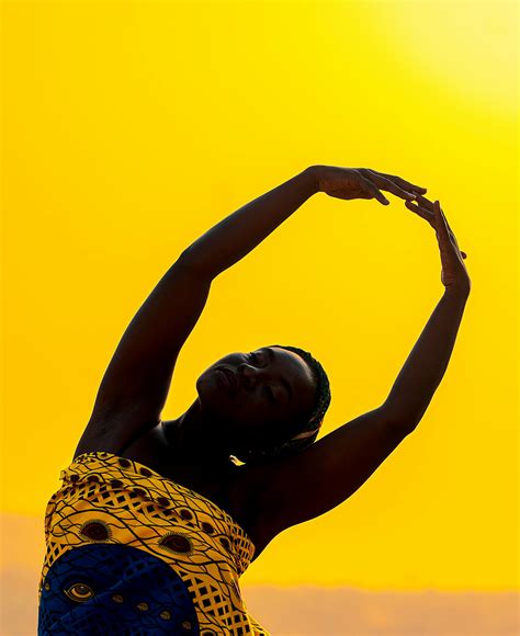 African woman dancing at sundown · Free Stock Photo
