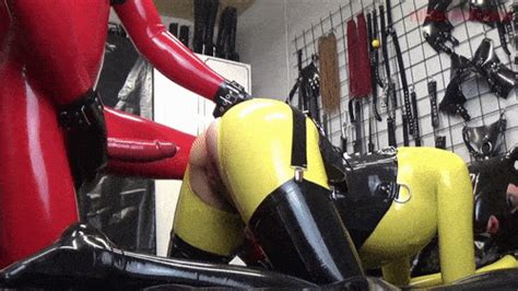 Latex sex in yellow and red latex catsuits - RubberHell - latex fetish