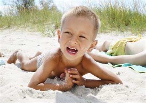 Portrait of Little Boy Smiling on the Background of the Sea Beach ...