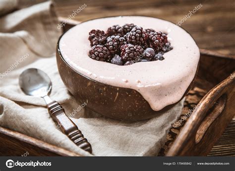 Vegan nice cream with banana and berries Stock Photo by ©gdolgikh 179495842