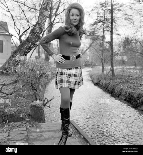 Woman leather miniskirt Black and White Stock Photos & Images - Alamy