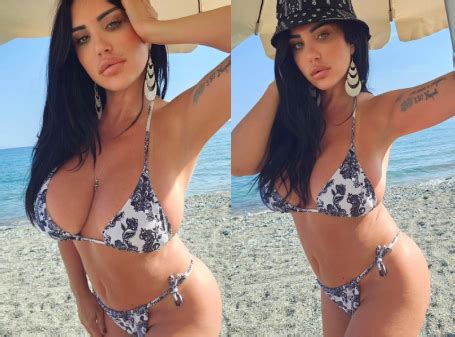 Italian reporter Marika Fruscio looks amazing at the beach in a bikini