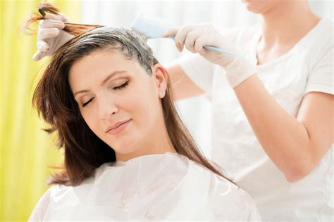 Influencers debate which burgundy hair dye brand lasts the longest 28