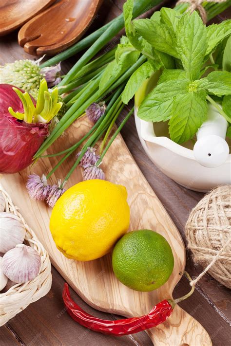 Premium Photo | Fresh herbs and spices on table