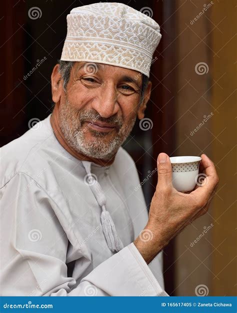 Man with Cup of Coffee in Oman Editorial Image - Image of people